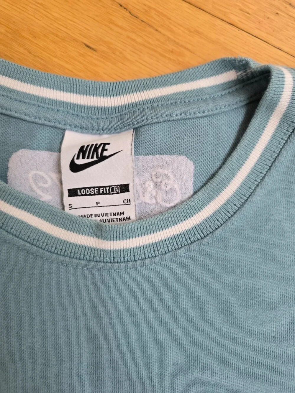 Vintage Y2K | Nike Pastel Blue Sporty Loose Fit Short Sleeve T-shirt | WMS S